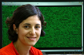 Kaye Award winner Naama Elefant with a computer screen of DNA sequence in the background. (Photo: Sasson Tiram)